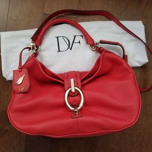 Orange designer handbag